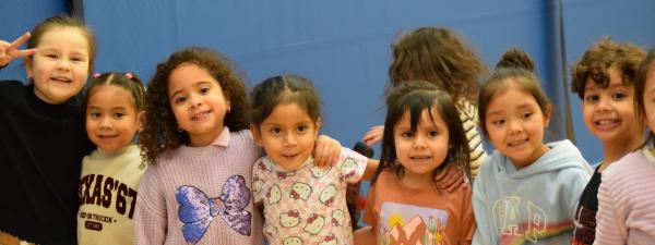 Children in a line smiling