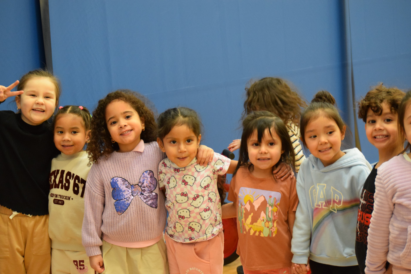 Children in a line smiling