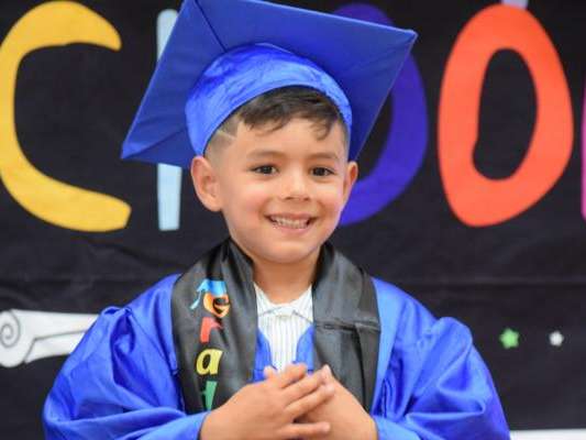 Presechool graduates celebrate with family 