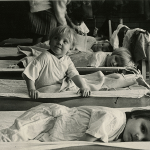 Children napping on cots
